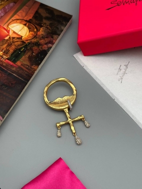 Брошь Schiaparelli
